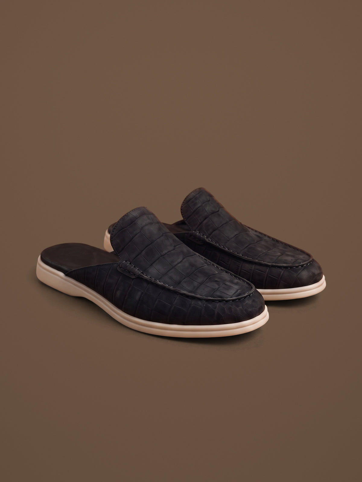 The Antibes Mule — Black, pair, front three-quarter view
