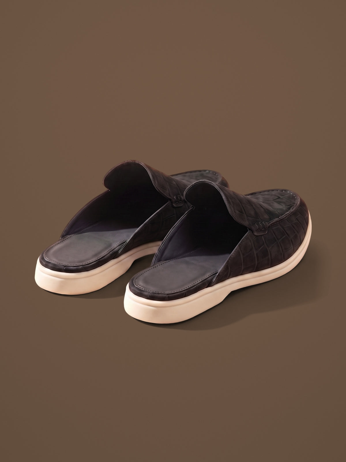 The Antibes Mule — Black, pair from behind, open back