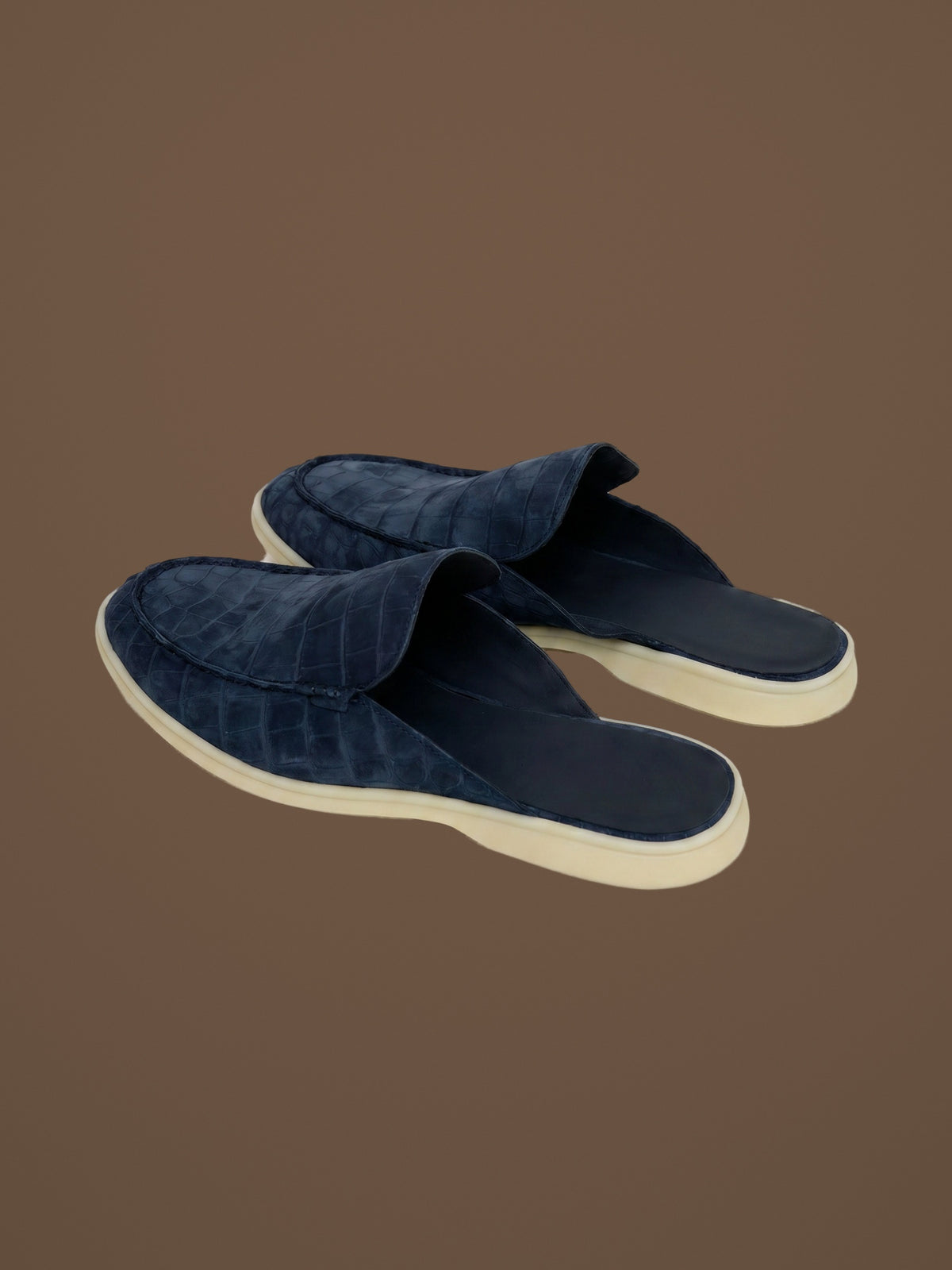 The Antibes Mule — Navy, pair, three-quarter view