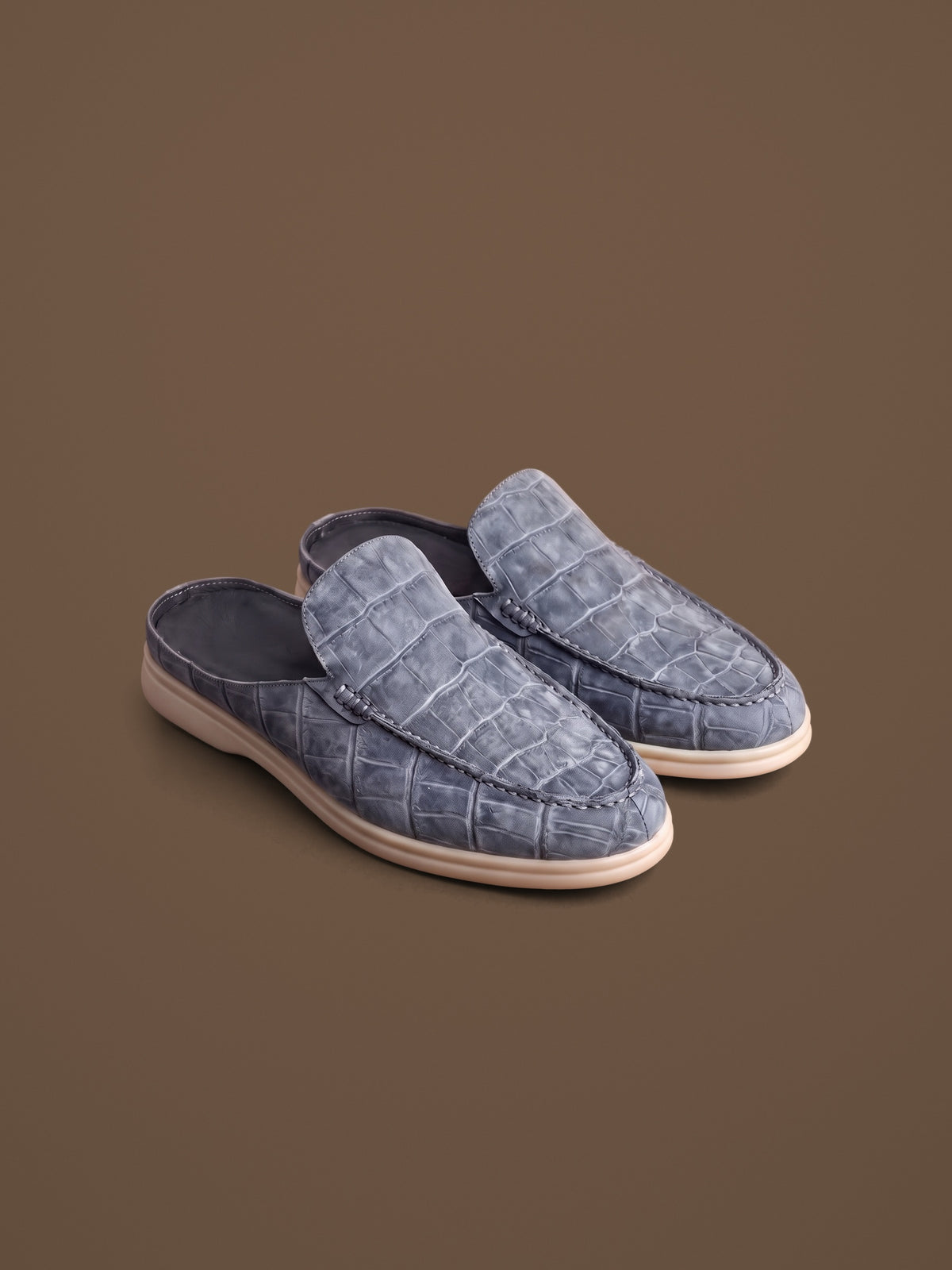 The Antibes Mule — Slate, pair, front three-quarter view