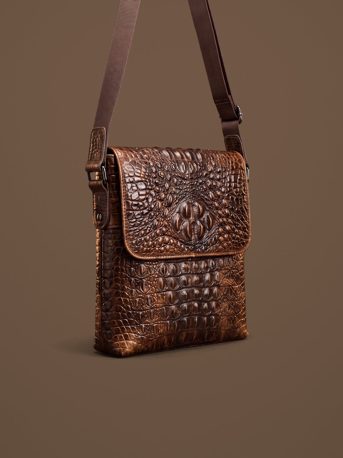 The Biarritz Crossbody — Brown, three-quarter view