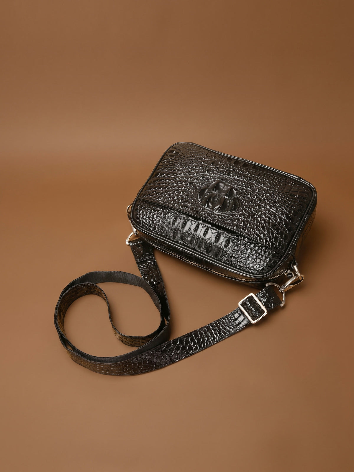 The Cassis Belt Bag — Black, from above with its strap